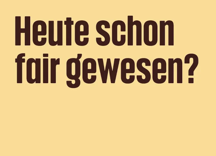 Auf zartgelbem Hintergrund steht mit dunkelbrauner Schrift "Heute schon fair gewesen?"