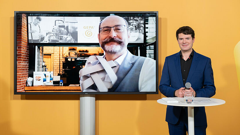 Peter Schaumberger, Geschäftsführer Marke und Vertrieb bei der GEPA, und Björn Böhning, Staatssekretär im Bundesministerium für Arbeit und Soziales | Foto: BMAS / Konrad Schmidt